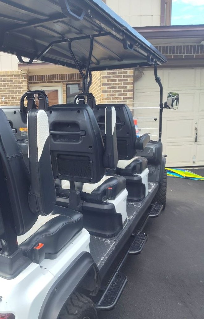 6 passenger golf cart rental Miramar Beach rear view
